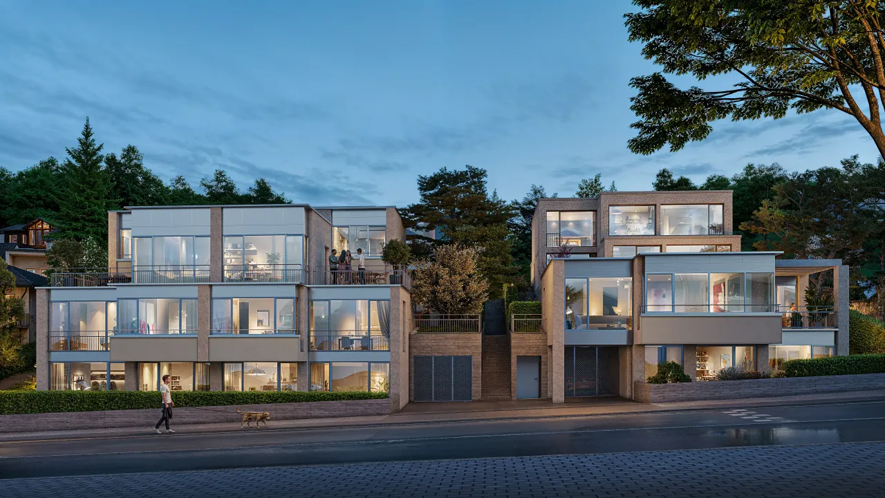 Evening rendering of terraced townhouses with glazed facades and lit interiors