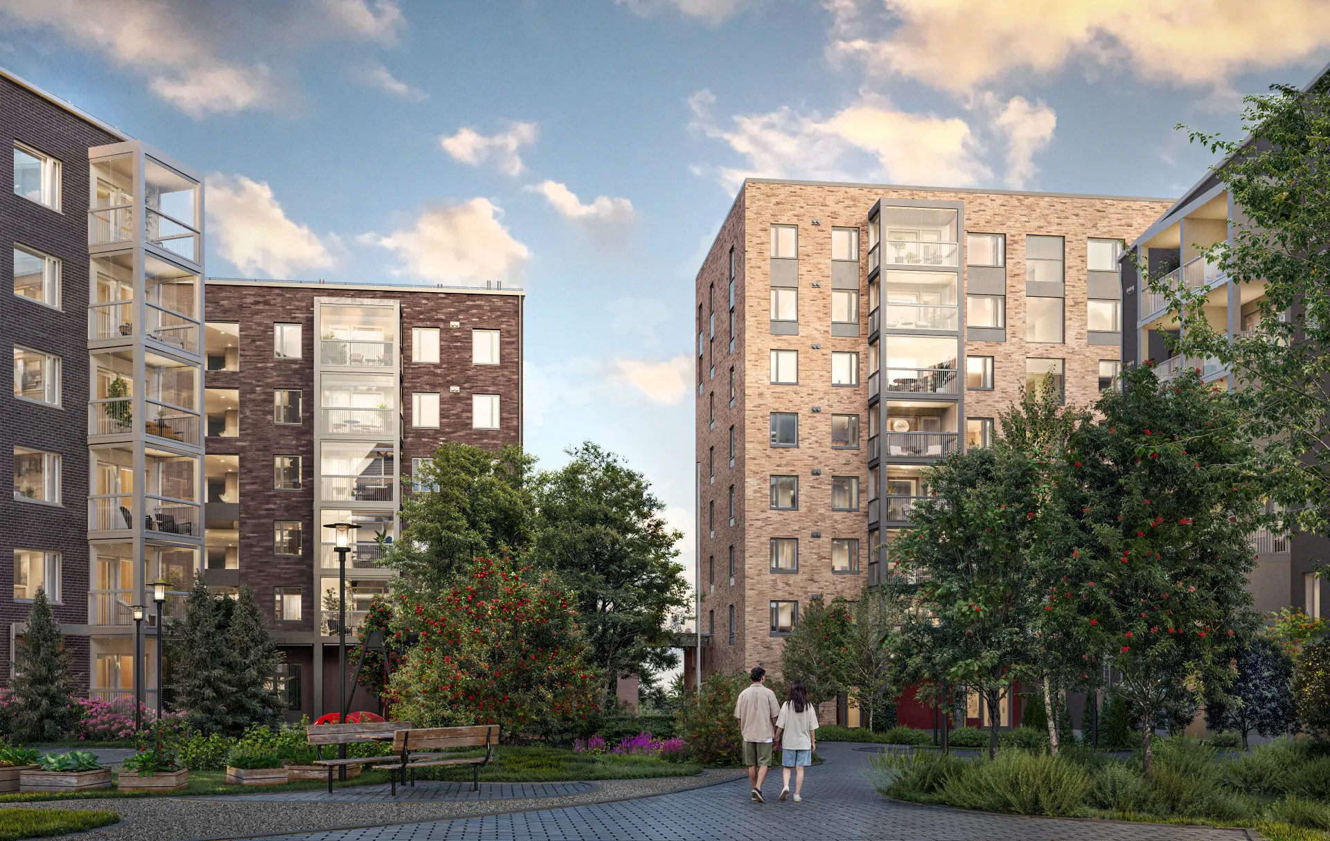 Exterior rendering of brick apartment towers with glazed stair cores around a landscaped courtyard where two people walk, in soft evening light