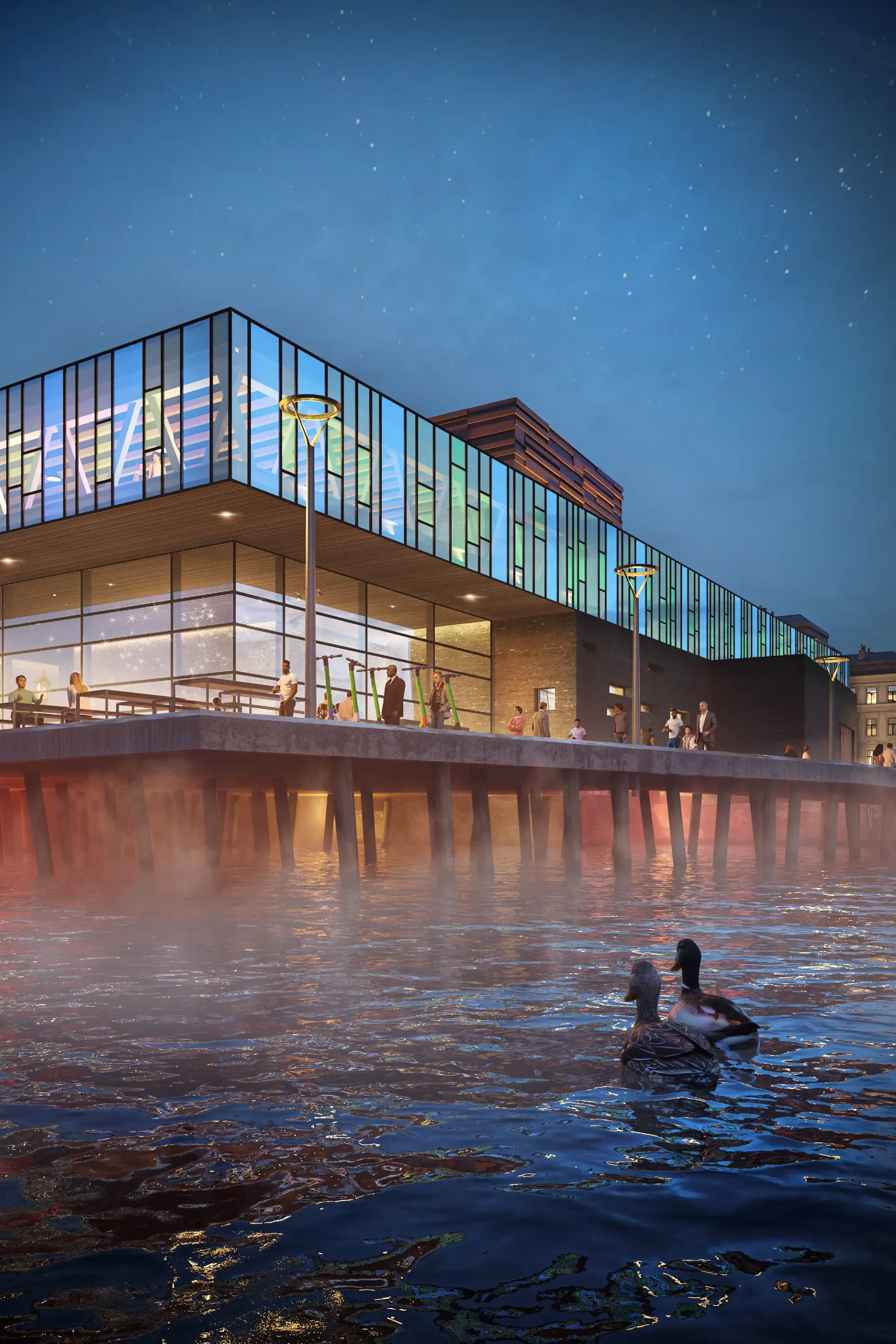 Exterior rendering at night of a glass-fronted waterside building on a pier, with warmly lit water and two swimmers in the foreground